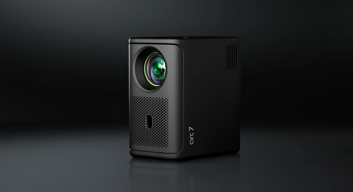 4K smart projector — front 3/4 view with lens detail